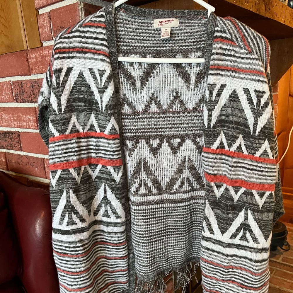Arizona sleeveless sweater shawl grey with Aztec design fringed bottom side slit